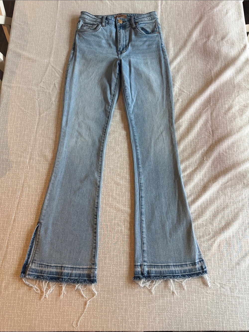 Kut from the Kloth Light Blue Stella high rise Flared Jeans with Raw Hem